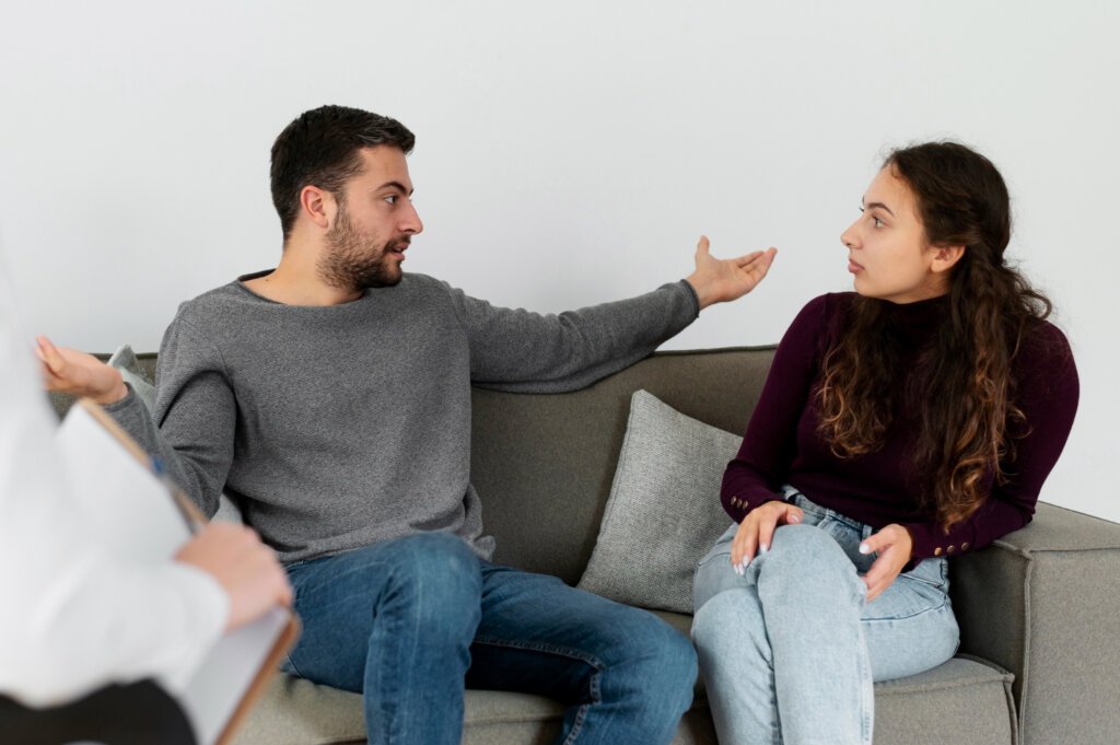 Couple discussing the emotional effects of performance anxiety on their relationship